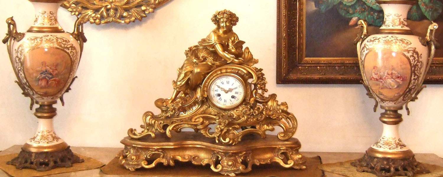 mantel clock and porcelain sevres vase